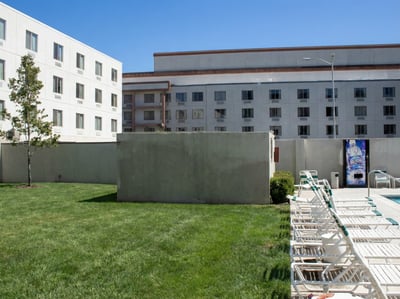 Pool west grass area